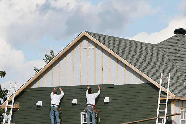 Professional Storm Damage Siding Repair technician working in New Market, VA